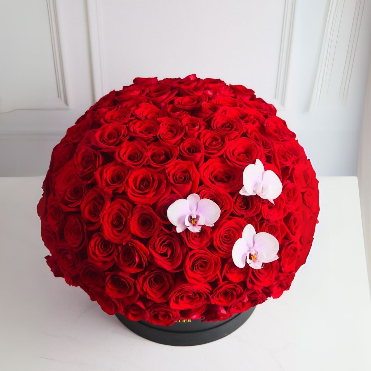 Box de 150 rosas rojas y orquídeas